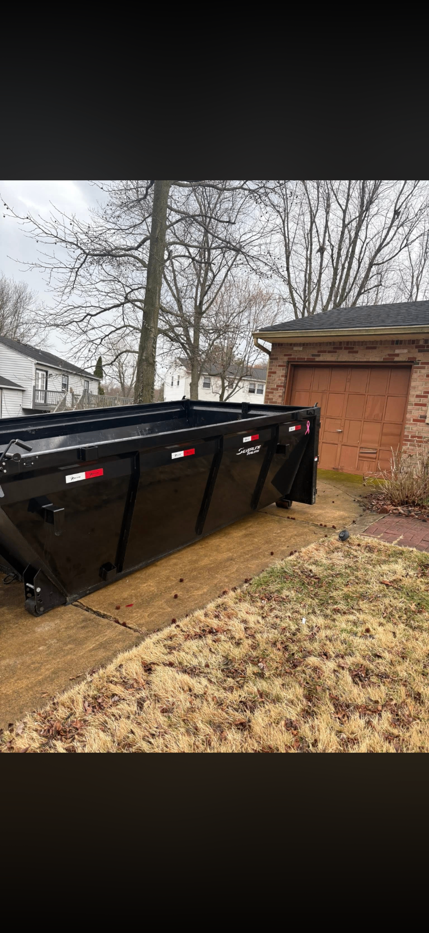 Roll-off dumpster delivered to a residential driveway in South Jersey